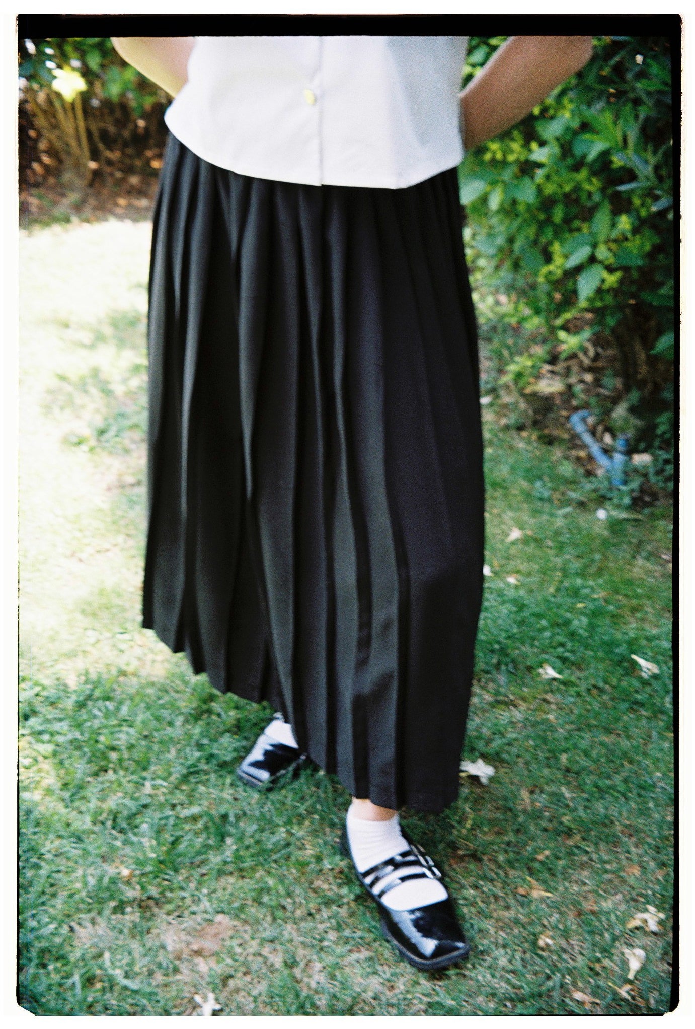 Falda larga tableada negra